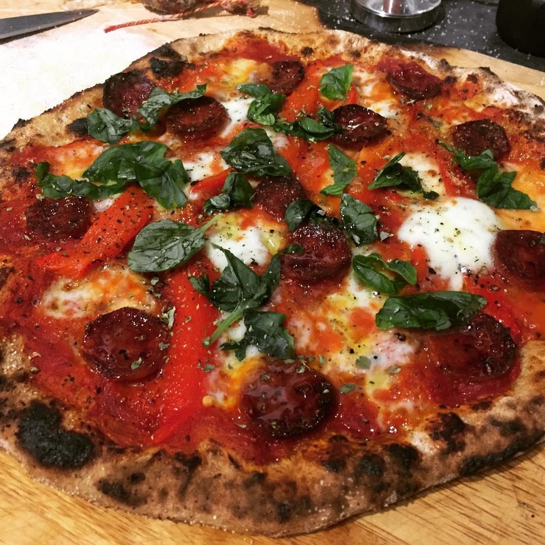 Pizza made in the outdoor oven yesterday.