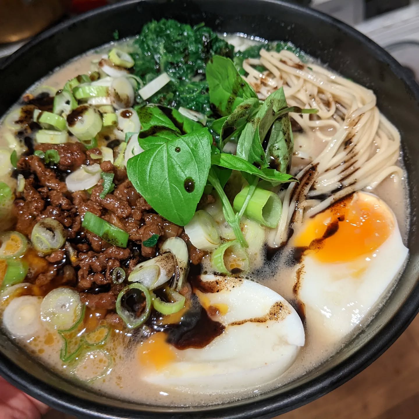 Tantanmen ramen. Pork broth from the freezer, Chinese wheat noodles, sesame tare (flavour), beef soboro, spinach, boiled egg and some mayu (black garlic oil). Bit simpler prep than the classic tonkotsu this one, but super rich and delicious! Made this from scratch tonight (not the broth) in about 45 min. Enough for a few more portions later in the week as well.