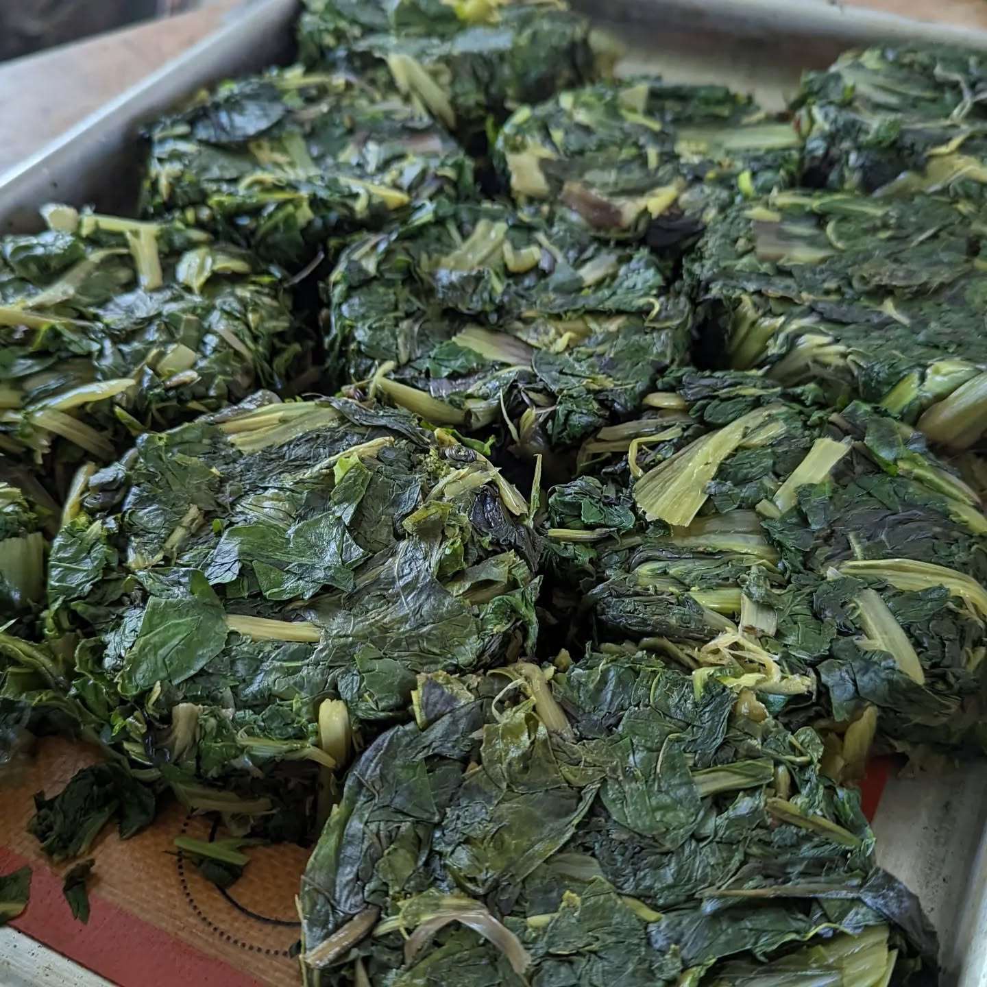Chard processing day. Lots of stuff in the garden to do this time of year. Unfortunately being away for a month meant I missed the ideal time to harvest the chard that was growing through the winter. All was not lost and I managed to get a decent enough harvest. Clean, remove snails, steam, put into small moulds, squeeze out some water, then freeze for later use.