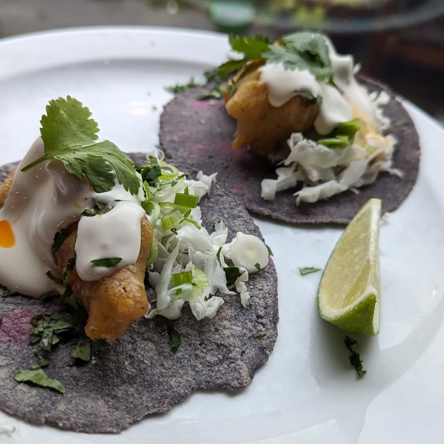 Ensenada fish tacos for Valentine's lunch. Thanks to super friendly and helpful Gabriel @casa.azul.brighton for the blue masa harina. They turned out great after my rather shoddy first attempt with masarepa. I hope to get a bit more knowledge on this deep and eclectic cuisine, it's quite a lot though! While reading around, I learned a little bit about a very interesting British author called Diana Kennedy, who lived until 99, in Mexico since the 1950s.