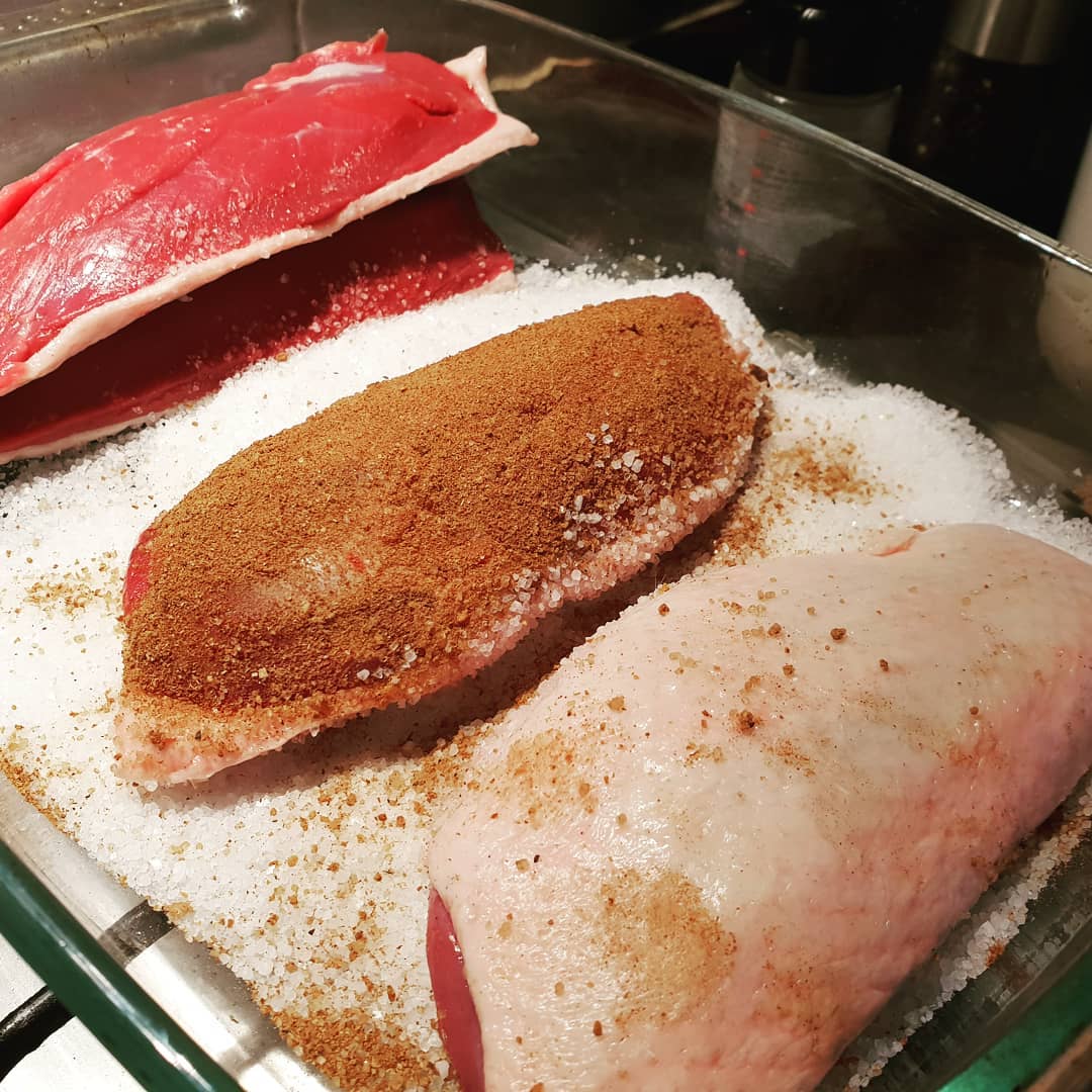 Duck breast about to get cured. 2 with juniper and bay, 2 with Chinese five spice. They've now been wrapped in muslin and are hanging in the beer fridge drying out.