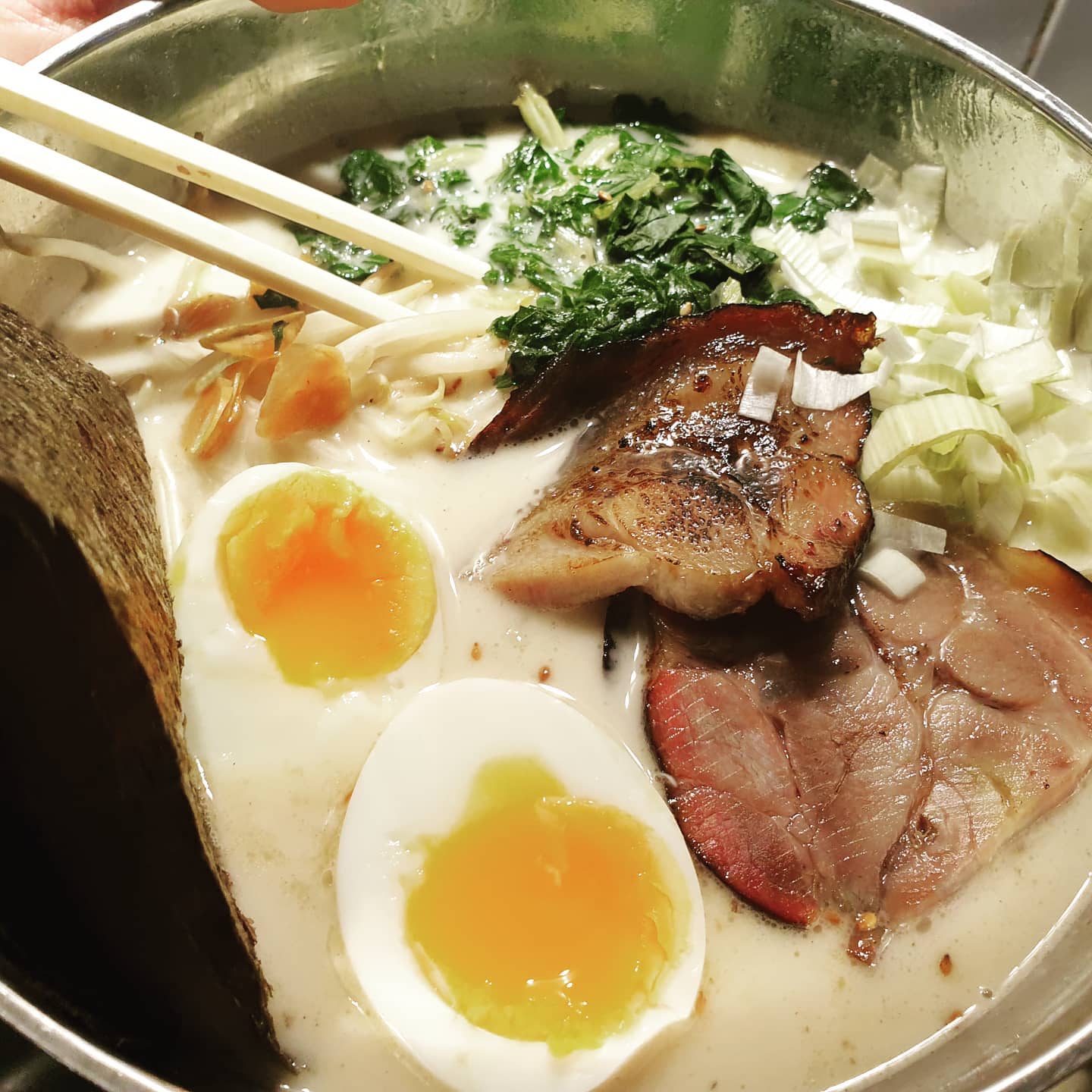 Tonkotsu ramen last night. Didn't go the whole 9 yards but some 6 or 7 of them. 5 hr pressure cooker pork shoulder and hock bone broth. About 4kgs of bones with 4 litres of water the final result, so 1:1 dilution was fine, it was quite concentrated. Reheated, added to some chicken stock I had, and blended to make emulsion (white colour).